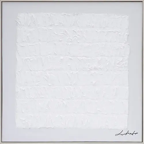Minimalist white textured wall art with raised geometric patterns