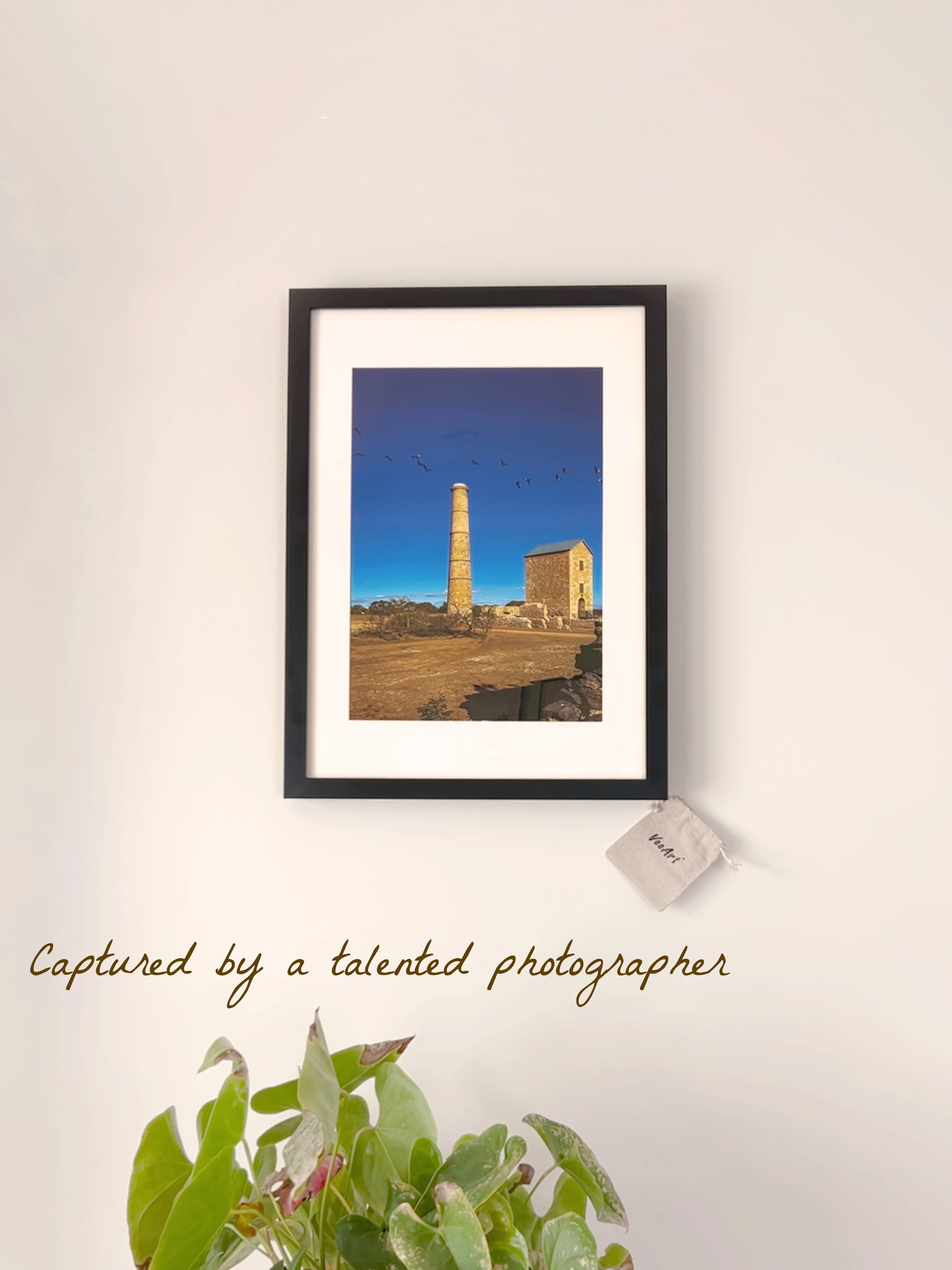 A framed photo print displayed on a wall, representing the best online photo printing Australia and VeeArt’s high-quality print and frame service.