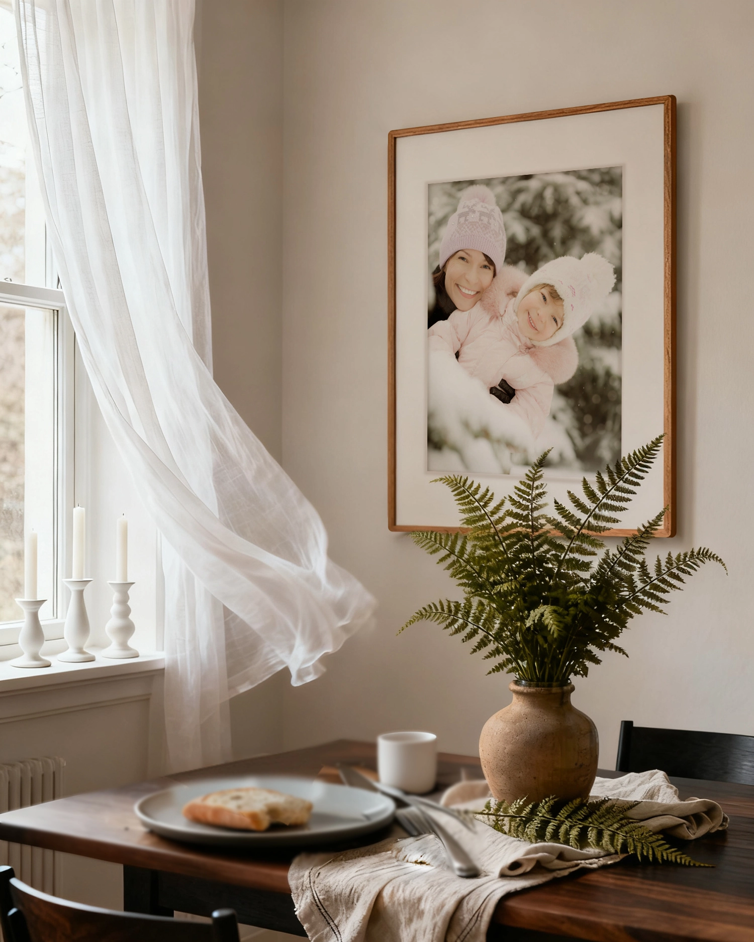 Warm dining corner with a Beechwood photo frame featuring a mother and child