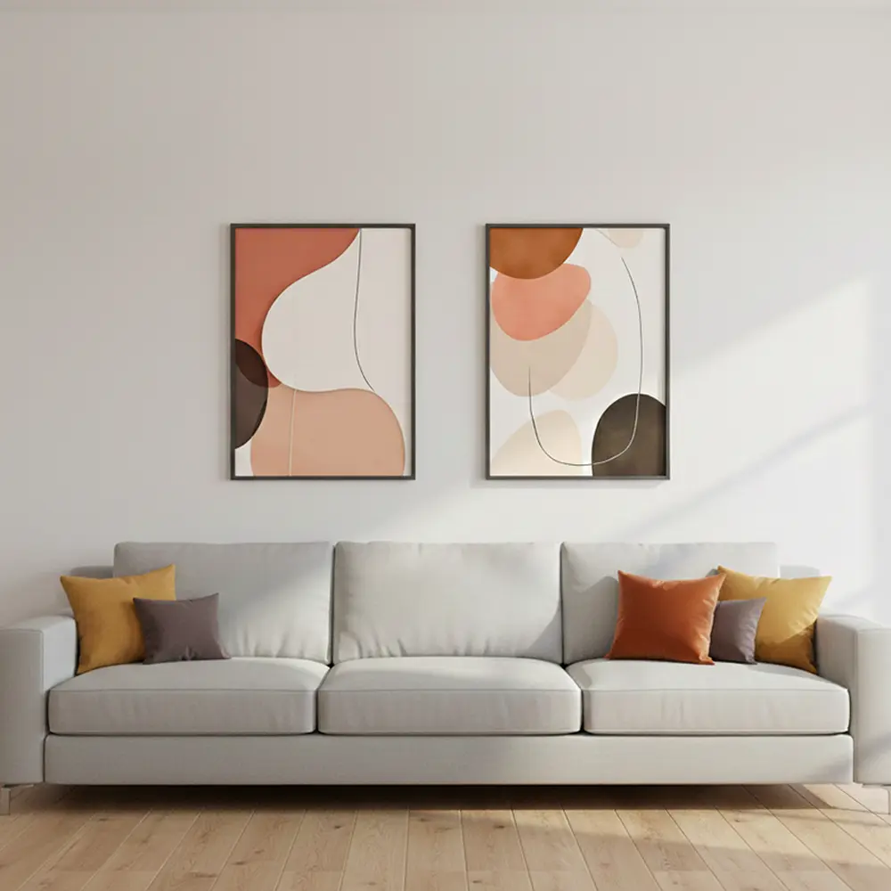 Pair of vertical abstract Canvas Prints Australia by VeeArt styled above a modern grey sofa.