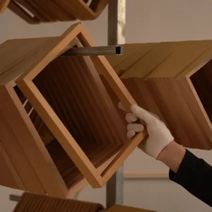 wooden picture frames hanging to dry after adhesive curing