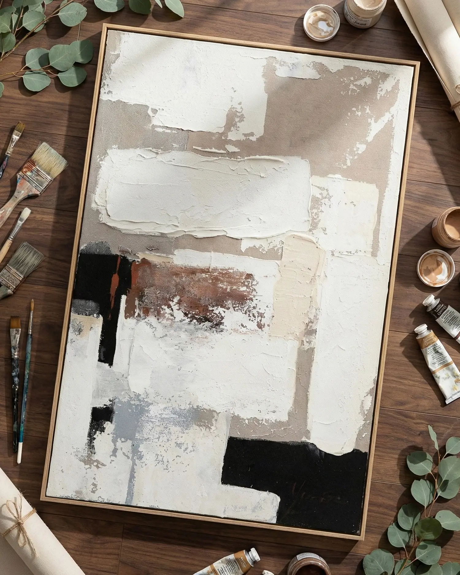 Artist applying texture to a textured wall art.