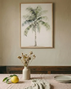 Coastal canvas wall art styled in a warm, natural dining room setting