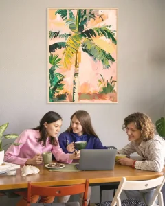 Large framed wall art in a modern sunlit dining area
