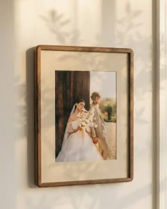 Wedding photo in a single wood frame with wide matting.