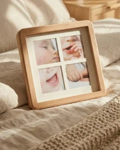 4-grid square collage frame on a neutral bedspread.